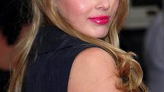 Woman blondes models red carpet blue dress looking back Keeley 