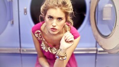 Woman blondes models washing machine