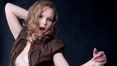 Woman blondes open mouth arms raised open shirt Met-Art 