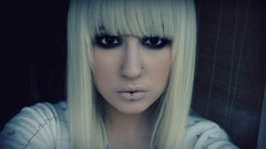 Woman blondes piercings bangs black eyes