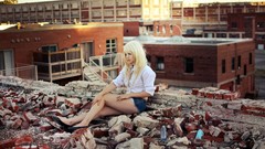 Woman blondes piercings denim shorts