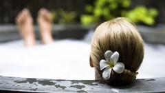 Woman blondes plumeria hot tub