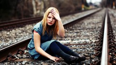 Woman blondes railroad tracks
