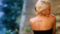 Woman blondes tattoos
