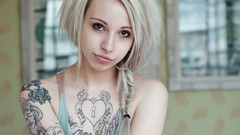 Woman blondes tattoos