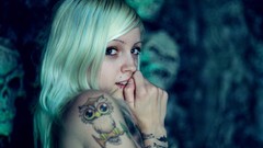 Woman blondes tattoos