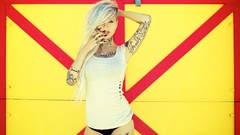 Woman blondes tattoos