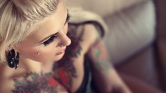 Woman blondes tattoos boobs