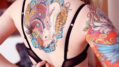 Woman blondes tattoos bra underwear undressing