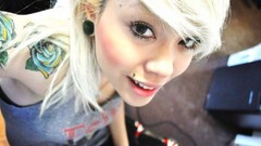 Woman blondes tattoos piercings