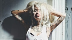 Woman blondes tattoos Sara Fabel