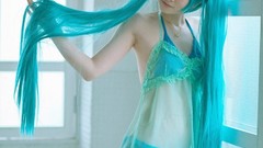 Woman blue cosplay vocaloid