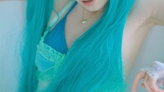 Woman blue cosplay vocaloid