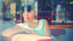 Woman blue eyes bangs window panes Pauline Hita