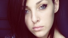 Woman blue eyes black hair