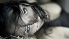 Woman blue eyes black hair tristania