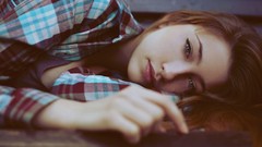 Woman blue eyes brunettes lying down