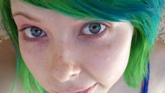Woman blue hair green hair