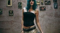 Woman blue hair piercings