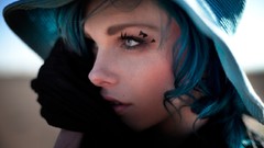 Woman blue hair piercings