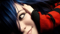 Woman blue hair smiling