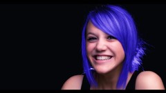 Woman blue hair smiling