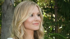 Woman board Kristen Bell blondes white dress