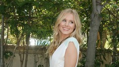 Woman board Kristen Bell blondes white dress