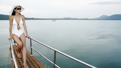 Woman Boats hats lakes models swimsuits