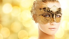 Woman bokeh golden masks Venetian masks