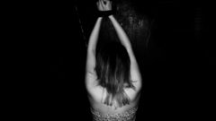 Woman bondage arms raised