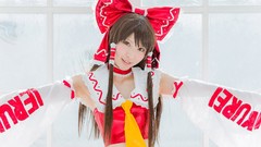 Woman bows asians smiling long hair armpits brown eyes indoors 