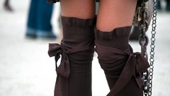Woman bows legs chains knee socks body parts