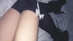 Woman bows legs pumps knee socks high heels body parts