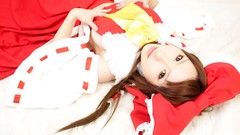 Woman bows long hair hakurei reimu touhou miko cosplay video 