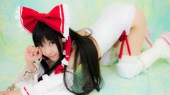 Woman bows long hair hakurei reimu touhou miko cosplay video 