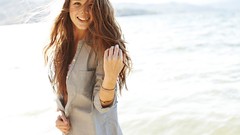 Woman bracelets smiling