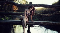 Woman Bridges looking down barefoot rivers redheads