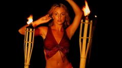 Woman Britney Spears flames blondes singers arms raised exposed 