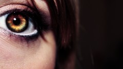 Woman brown eyes macro