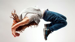 Woman brown jeans Nike jumping models arched back