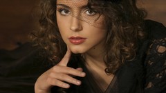 Woman brunettes curly hair