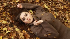 Woman brunettes fallen leaves