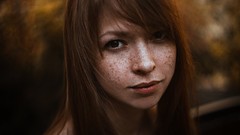 Woman brunettes freckles the sun