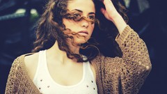 Woman brunettes hand on head