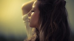 Woman brunettes hands on head upscaled