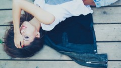 Woman brunettes lying down