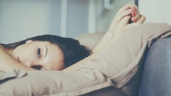 Woman brunettes lying down
