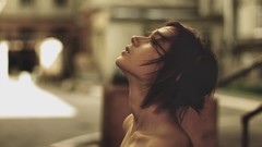 Woman brunettes models bare shoulders blurred background 