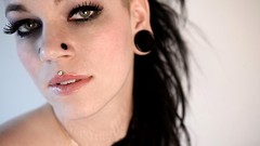 Woman brunettes piercings